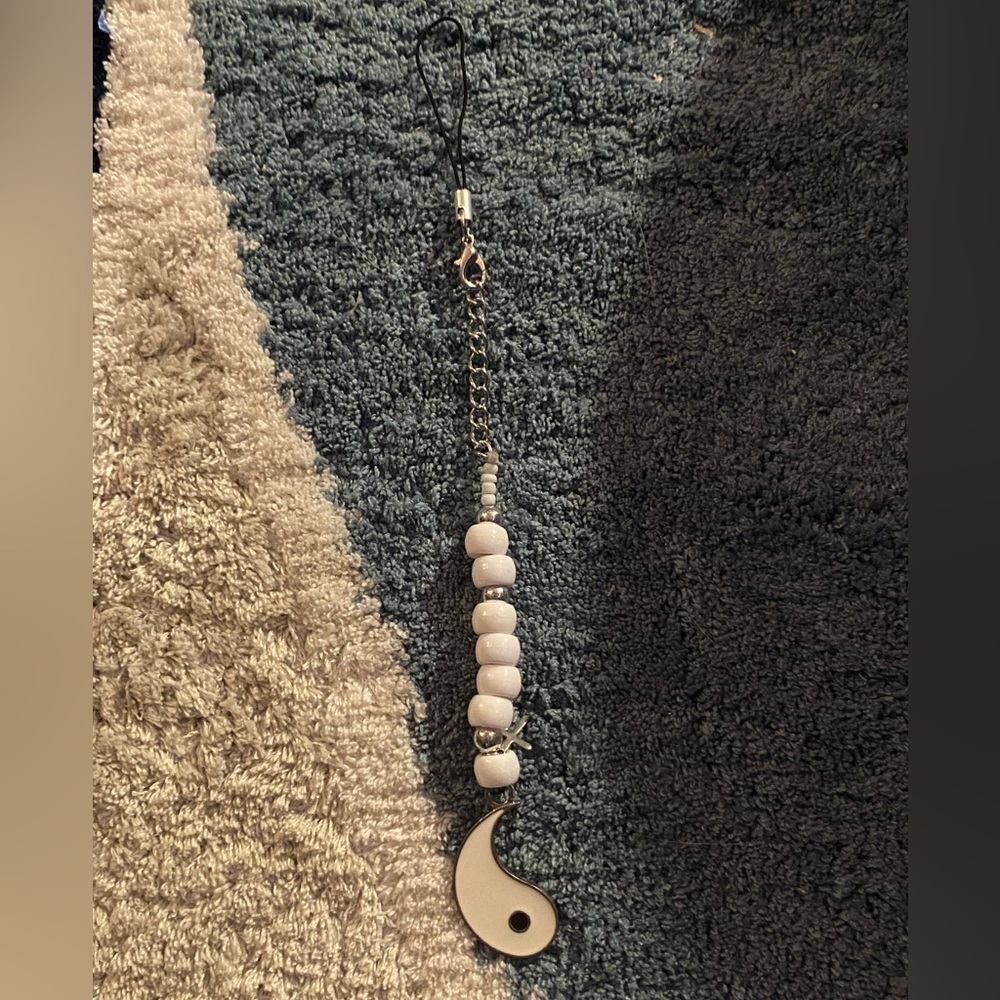 White hand made keychain